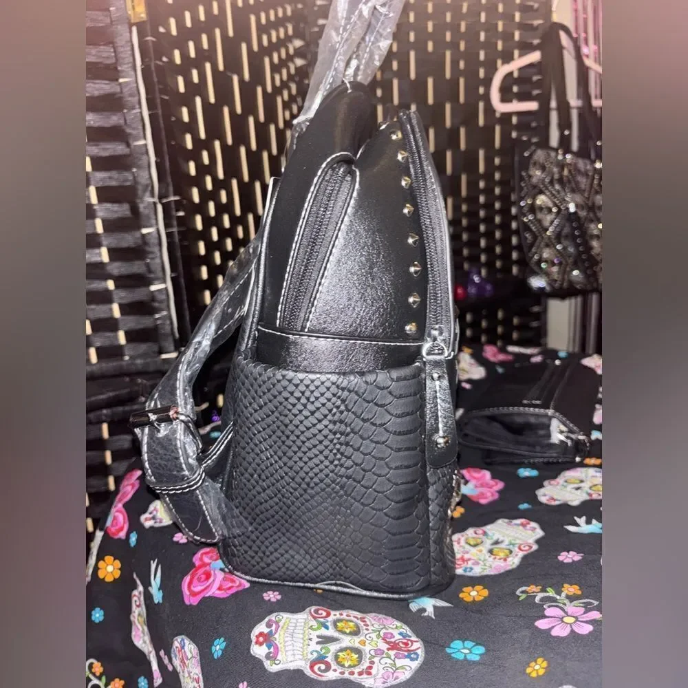 Edgy Backpack with Studded Skull Design